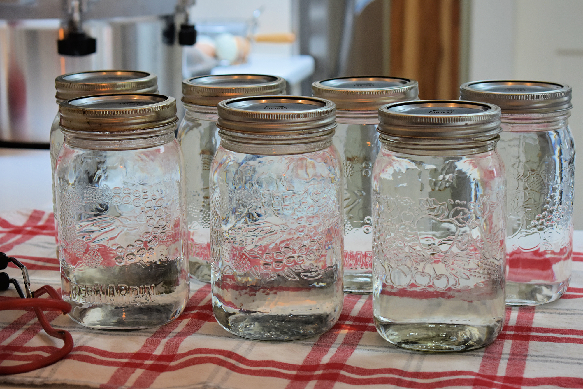 Mason jars of canned water.